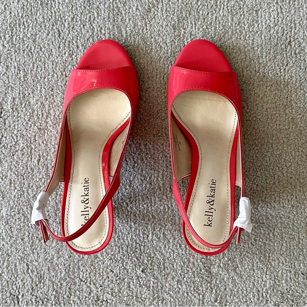 Kelly & Katie pink patent leather, open toe, (2.5in) sling back heel. Size 8M.